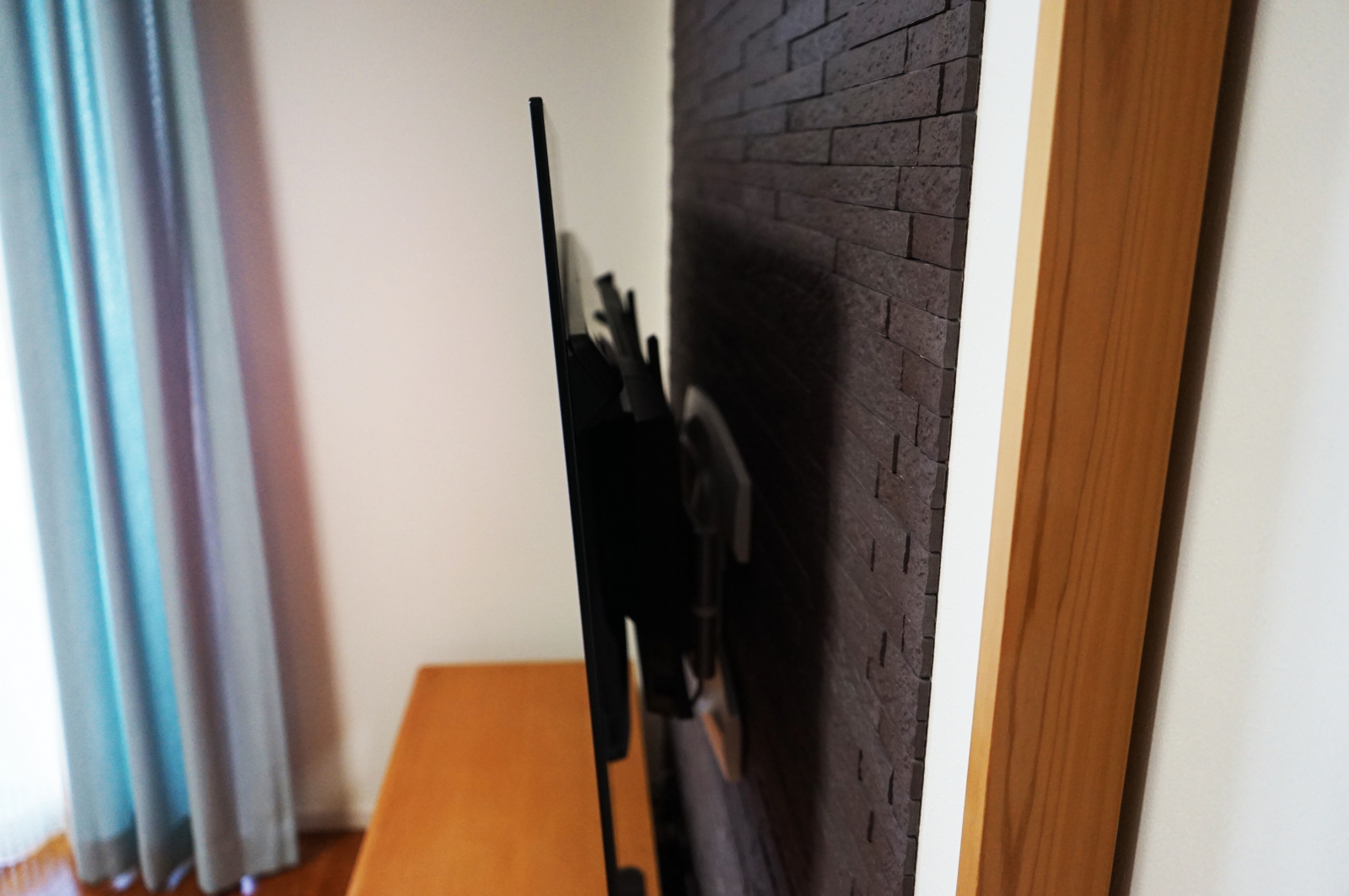 55インチ有機ELテレビの壁掛けとエコカラットの同時施工 画像No.1
